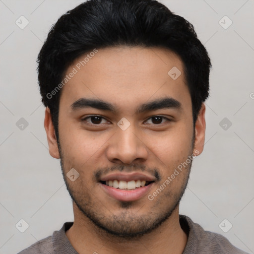 Joyful asian young-adult male with short  black hair and brown eyes