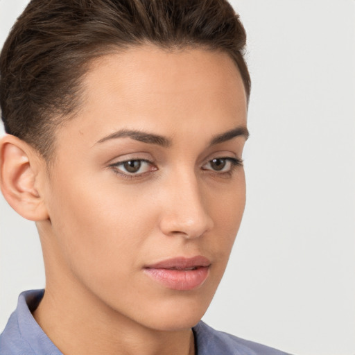 Neutral white young-adult female with short  brown hair and brown eyes