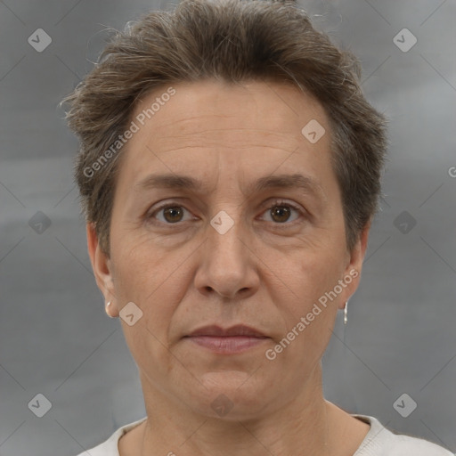 Joyful white adult female with short  brown hair and brown eyes