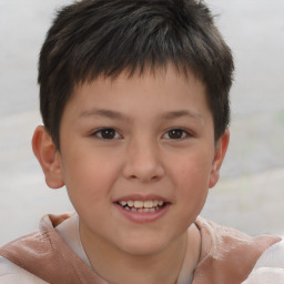 Joyful white child male with short  brown hair and brown eyes