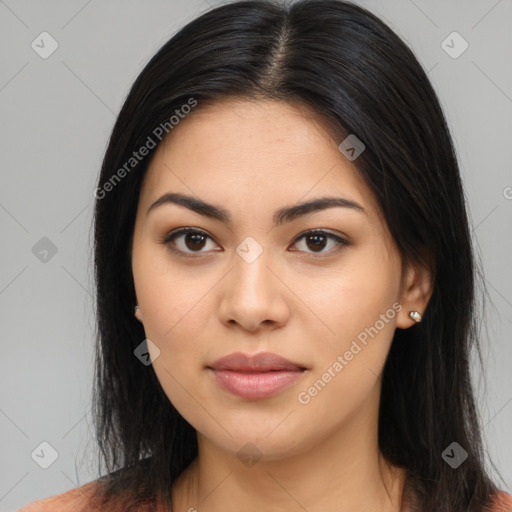 Joyful latino young-adult female with long  brown hair and brown eyes