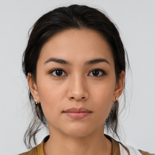 Neutral latino young-adult female with medium  brown hair and brown eyes
