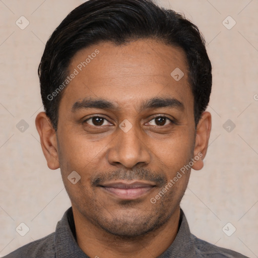 Joyful latino young-adult male with short  black hair and brown eyes
