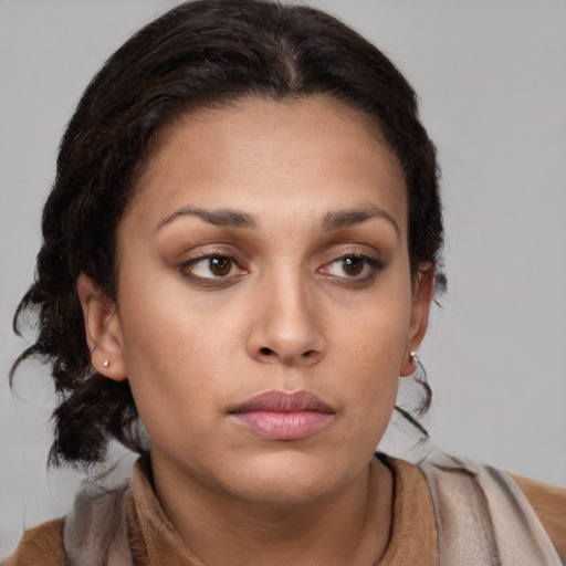 Neutral latino young-adult female with medium  brown hair and brown eyes