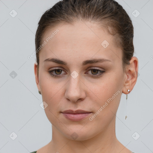 Neutral white young-adult female with short  brown hair and grey eyes