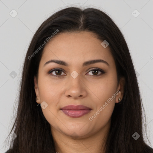 Joyful latino young-adult female with long  brown hair and brown eyes