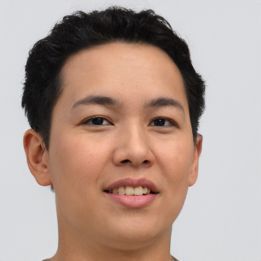 Joyful asian young-adult female with short  brown hair and brown eyes