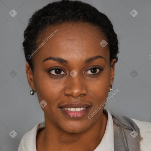 Joyful black young-adult female with short  brown hair and brown eyes