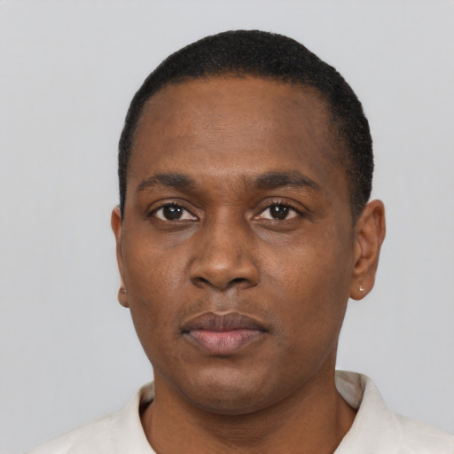 Neutral black young-adult male with short  black hair and brown eyes
