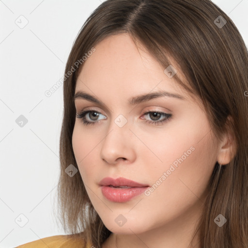 Neutral white young-adult female with long  brown hair and brown eyes