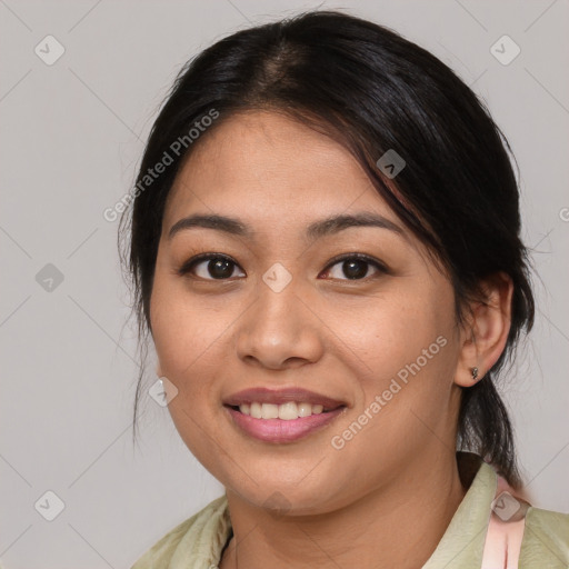 Joyful asian young-adult female with medium  brown hair and brown eyes