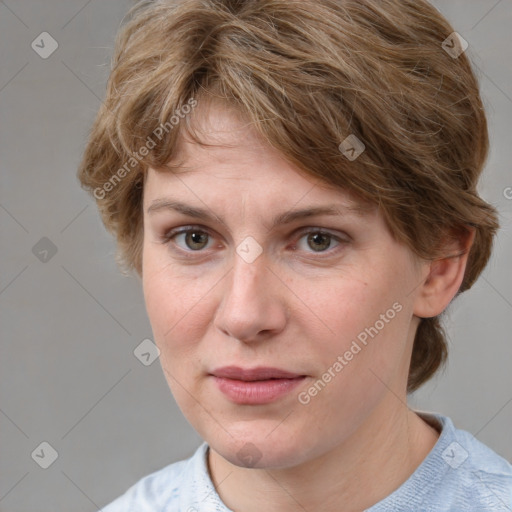 Joyful white young-adult female with medium  brown hair and blue eyes