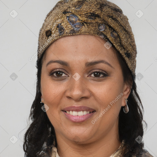 Joyful black young-adult female with long  brown hair and brown eyes