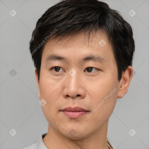 Neutral asian young-adult male with short  black hair and brown eyes