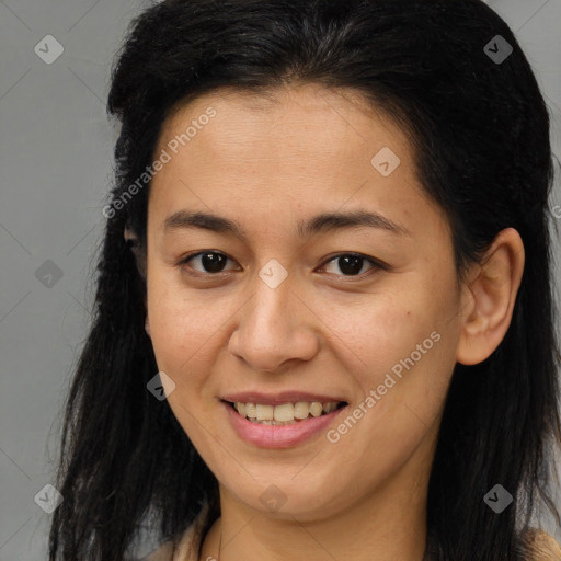 Joyful latino young-adult female with long  brown hair and brown eyes