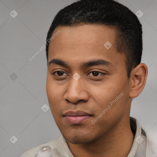 Joyful latino young-adult male with short  black hair and brown eyes