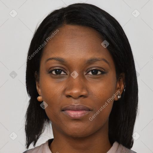 Neutral black young-adult female with medium  black hair and brown eyes