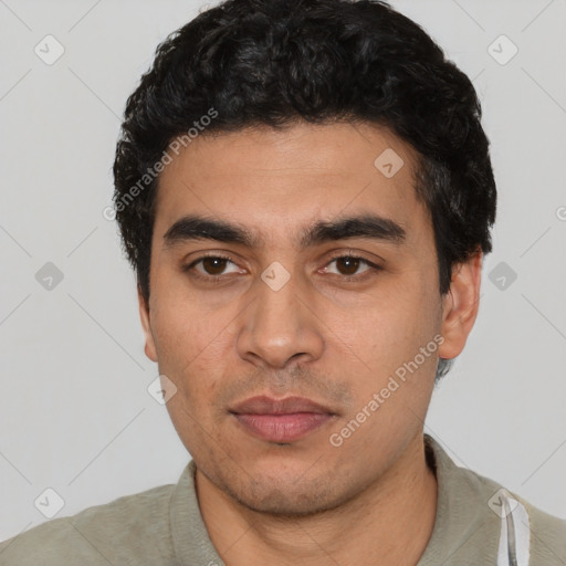 Neutral white young-adult male with short  black hair and brown eyes