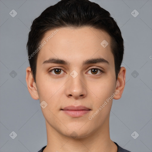 Joyful white young-adult male with short  black hair and brown eyes