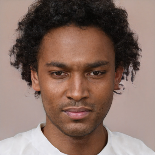 Neutral black young-adult male with short  brown hair and brown eyes