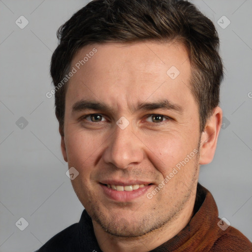 Joyful white adult male with short  brown hair and grey eyes