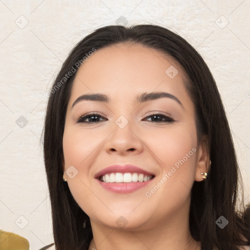 Joyful white young-adult female with long  black hair and brown eyes