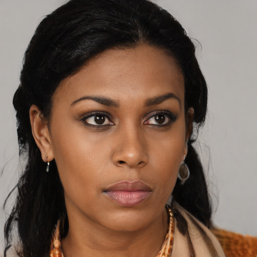 Neutral latino young-adult female with long  black hair and brown eyes
