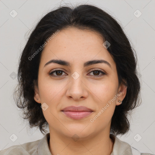 Joyful latino young-adult female with medium  brown hair and brown eyes