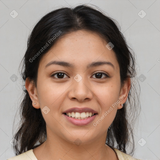 Joyful latino young-adult female with medium  brown hair and brown eyes