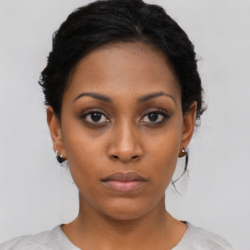 Neutral black young-adult female with short  black hair and brown eyes