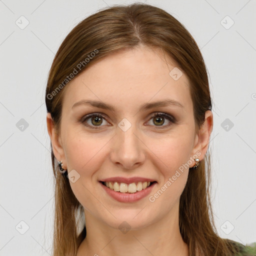 Joyful white young-adult female with long  brown hair and green eyes