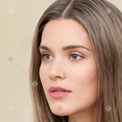 Neutral white young-adult female with long  brown hair and brown eyes