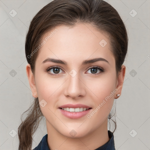 Joyful white young-adult female with medium  brown hair and grey eyes