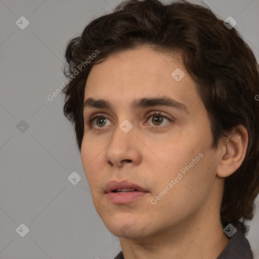 Neutral white young-adult male with medium  brown hair and brown eyes