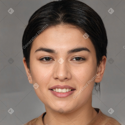 Joyful white young-adult female with medium  brown hair and brown eyes