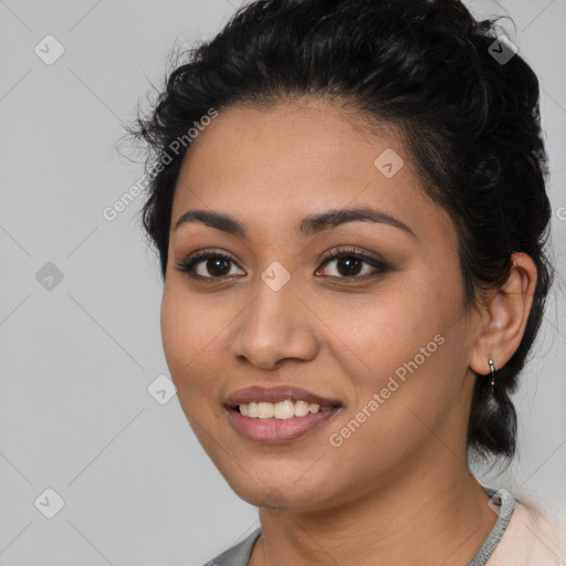 Joyful latino young-adult female with medium  black hair and brown eyes