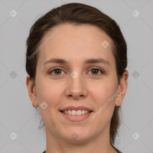 Joyful white young-adult female with medium  brown hair and grey eyes