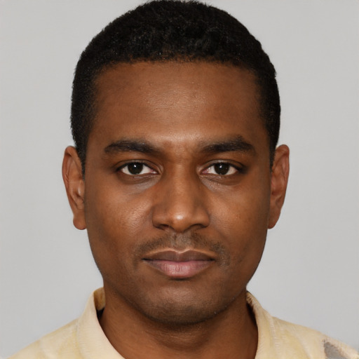 Neutral black young-adult male with short  black hair and brown eyes
