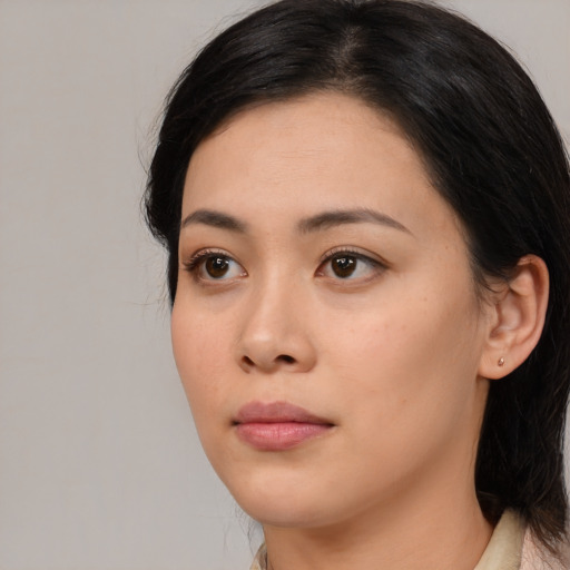 Neutral asian young-adult female with medium  black hair and brown eyes