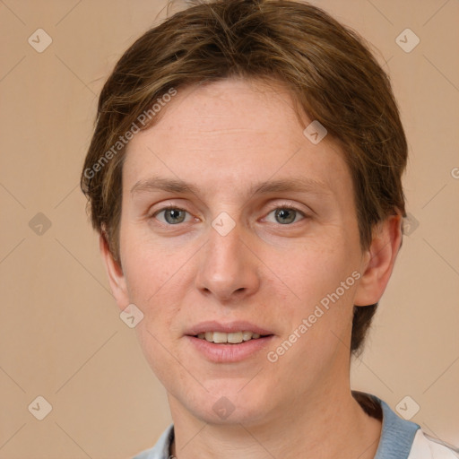 Joyful white adult female with short  brown hair and grey eyes