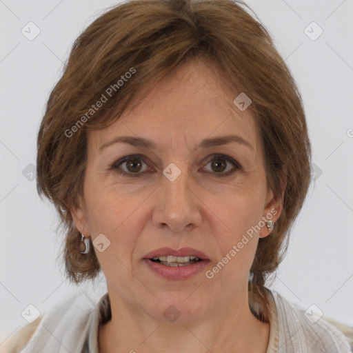 Joyful white adult female with medium  brown hair and brown eyes