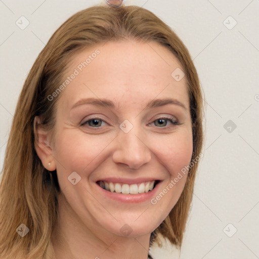 Joyful white young-adult female with long  brown hair and grey eyes