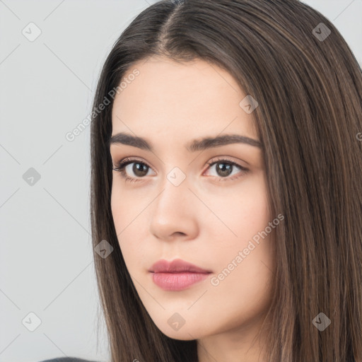 Neutral white young-adult female with long  brown hair and brown eyes