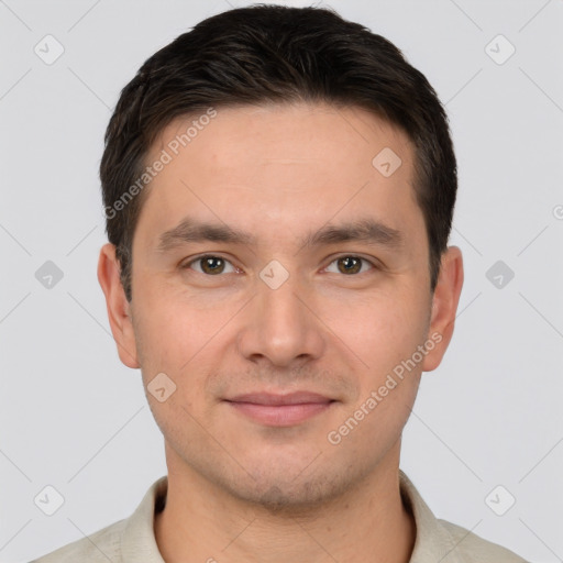 Joyful white young-adult male with short  brown hair and brown eyes