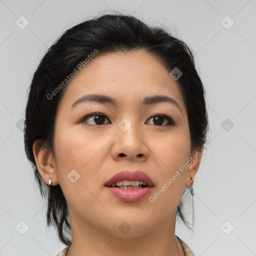 Joyful asian young-adult female with medium  brown hair and brown eyes