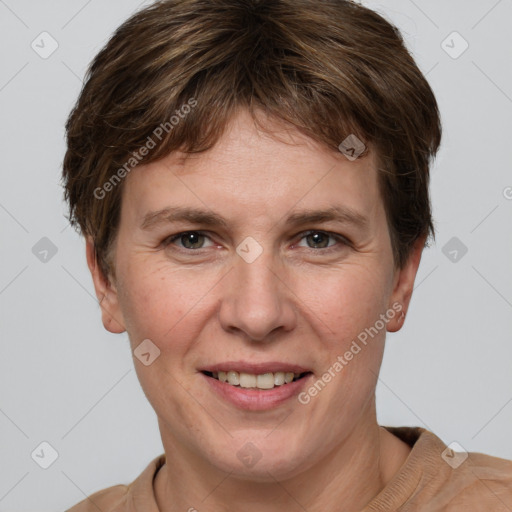 Joyful white adult female with short  brown hair and grey eyes