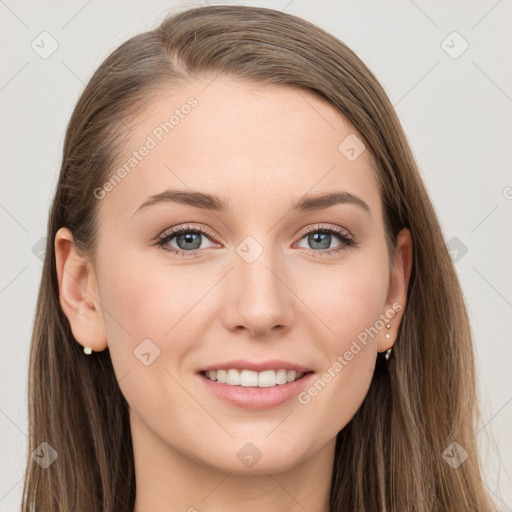 Joyful white young-adult female with long  brown hair and grey eyes