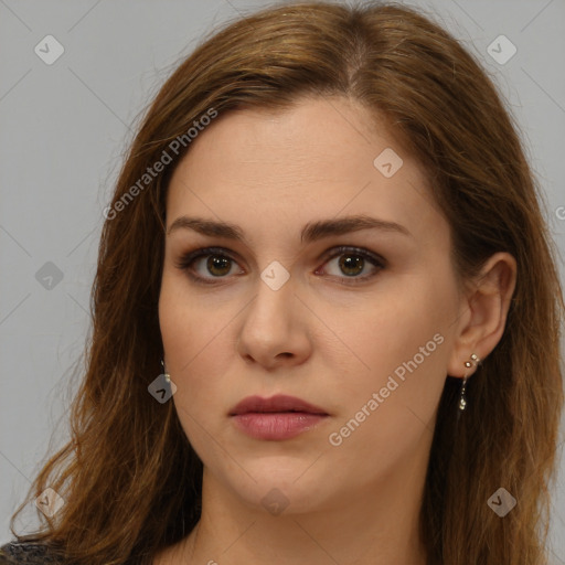 Neutral white young-adult female with long  brown hair and brown eyes