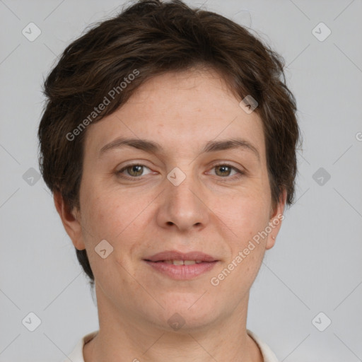 Joyful white adult female with short  brown hair and grey eyes