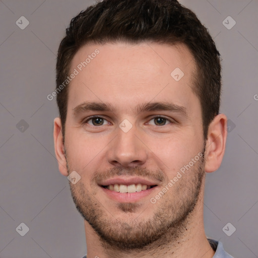 Joyful white young-adult male with short  brown hair and brown eyes